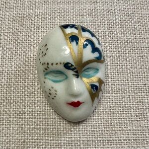 Vintage porcelain clown mask brooch with Gold and Blue accents